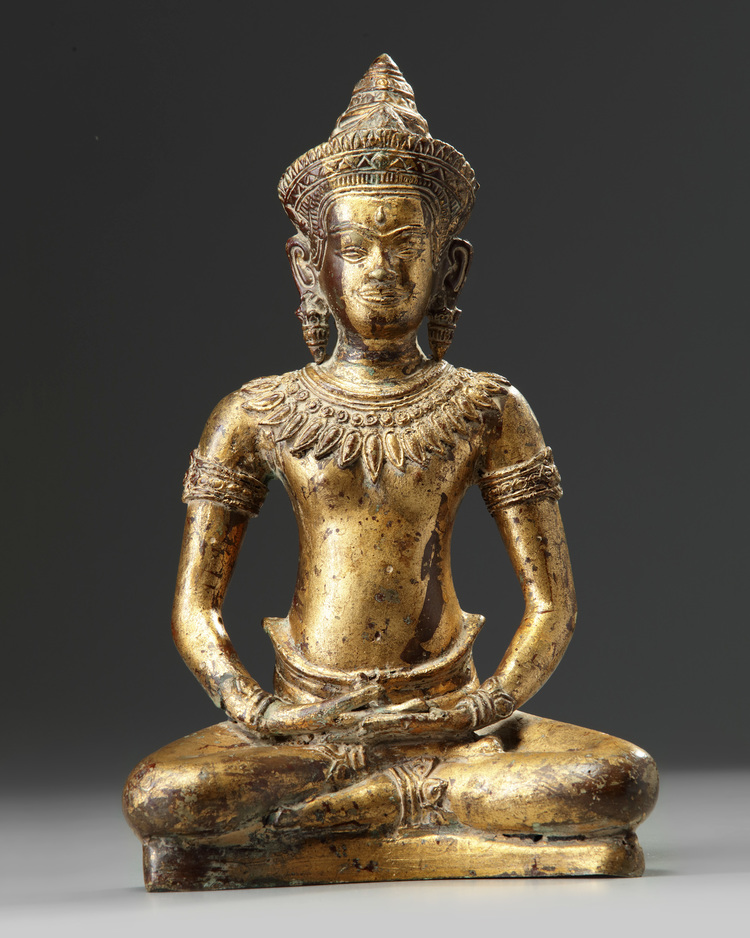 A Khmer gilt bronze figure of a Buddha