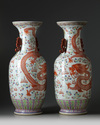 A pair of Chinese famille rose ‘dragon and phoenix’ vases