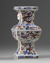 A Chinese wucai square-section dragon and phoenix' vase, zun
