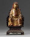 A Chinese gilt-lacquered wood figure of Wen Chang on a wooden throne
