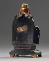 A Chinese gilt-lacquered wood figure of Wen Chang on a wooden throne