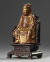 A Chinese gilt-lacquered wood figure of Wen Chang on a wooden throne