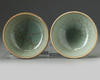 A pair of small Chinese Longquan celadon crackle-glazed bowls