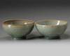 A pair of small Chinese Longquan celadon crackle-glazed bowls