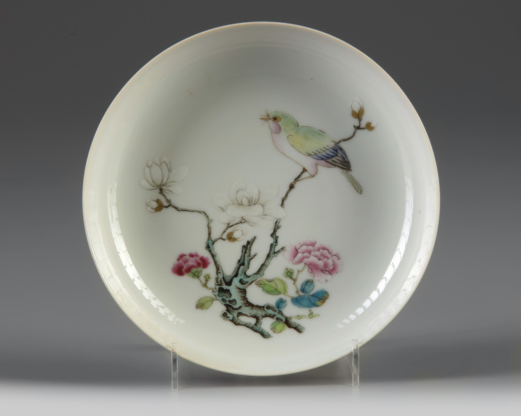 A small Chinese ruby-back famille rose 'bird and flower' dish