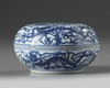 A Chinese blue and white 'dragon' round box and cover