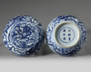 A Chinese blue and white 'dragon' round box and cover