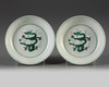 A pair of Chinese green-enamelled 'dragon' dishes