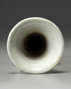 A Chinese pale celadon-glazed gu vase