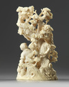 A Chinese carved ivory 'boys and pine' group