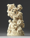 A Chinese carved ivory 'boys and pine' group