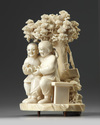 A Chinese ivory carving of an elderly couple
