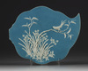 A Chinese blue-glazed 'bird' leaf-shaped tile