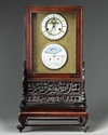 A Chinese gilt bronze clock in a hongmu case and stand