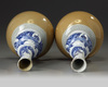 A pair of Chinese café-au-lait-glazed blue and white triple gourd vases