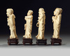 A group of four Chinese carved ivory Luohan