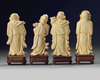 A group of four Chinese carved ivory Luohan