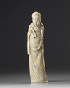 A Chinese carved ivory scholar