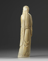 A Chinese carved ivory scholar