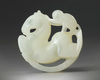 A Chinese white jade 'horse and monkey' carving