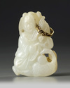 A Chinese pale celadon jade 'boy and crane' carving