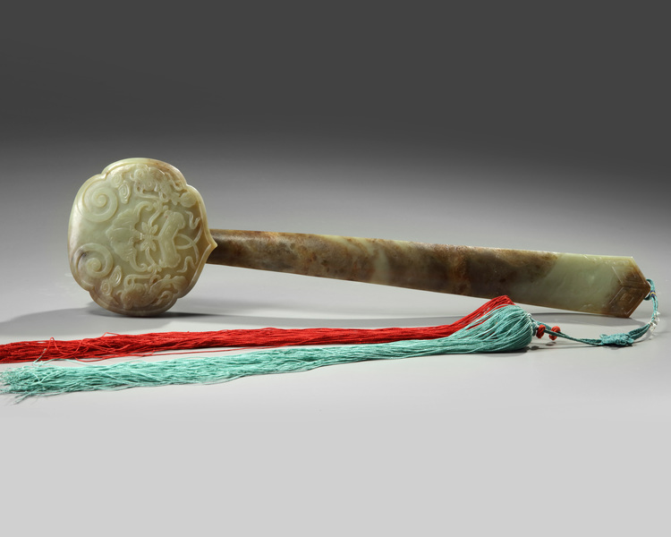 A LARGE CHINESE CELADON AND RUSSET JADE RUYI-SCEPTRE, CHINA, 19TH CENTURY
