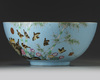 A large Chinese sgraffiato pale-blue-ground famille rose punch bowl