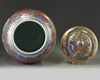 A large European-enamelled Chinese blue and white 'clobbered' vase and cover