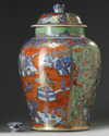 A large European-enamelled Chinese blue and white 'clobbered' vase and cover