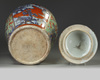 A large European-enamelled Chinese blue and white 'clobbered' vase and cover