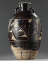 A Chinese carved Cizhou pottery jar
