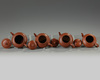 Four small Chinese yixing teapots and covers