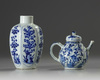 A Chinese blue and white moulded teapot and a hexagonal jar