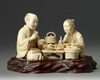 A Japanese Carved ivory okimono group