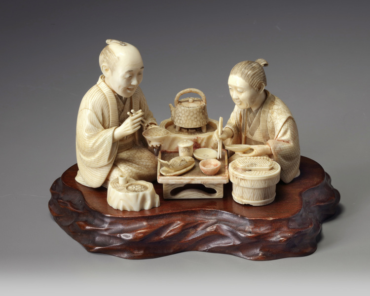 A Japanese Carved ivory okimono group