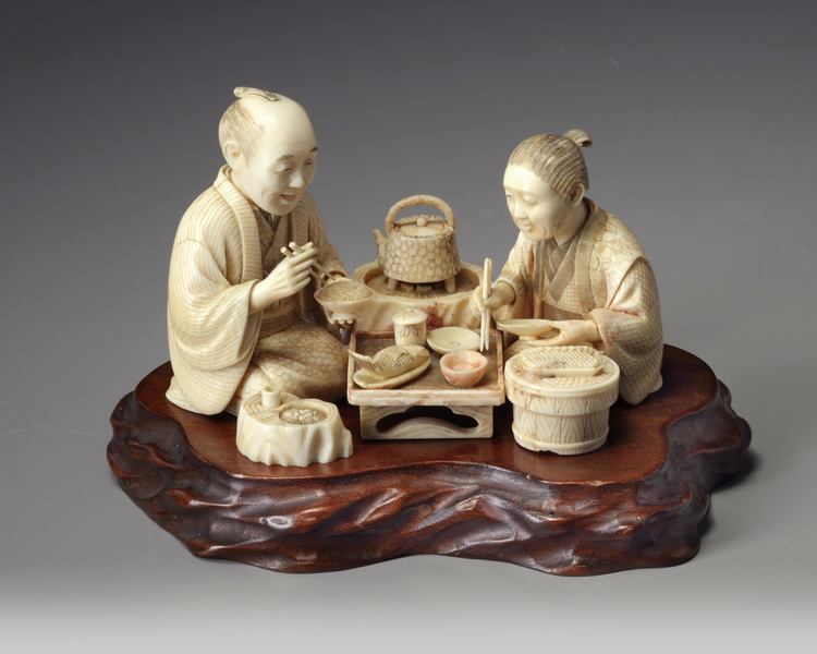 A Japanese Carved ivory okimono group