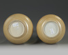 A pair of Chinese blue and white and cafe-au-lait glazed ewers