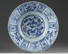 A CHINESE BLUE AND WHITE 'KRAAK PORCELAIN' BOWL, WANLI PERIOD (1573-1619)