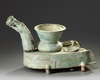 A CHINESE GREEN-GLAZED POTTERY STOVE WITH A DRAGON CHIMNEY