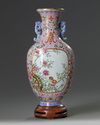 A Chinese pink-ground famille rose wall vase