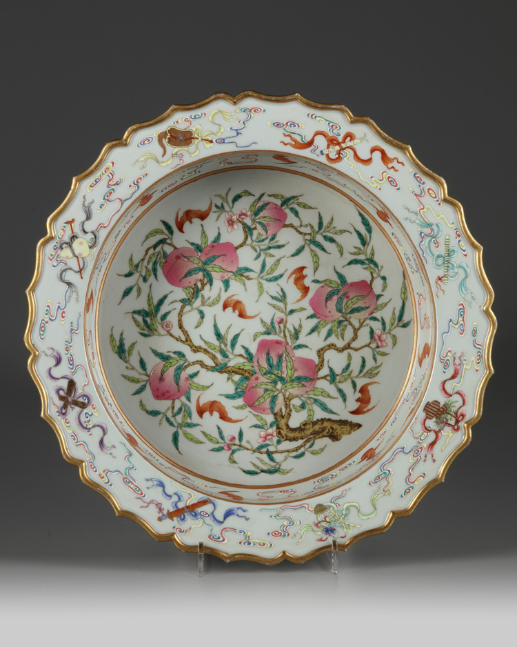 A large Chinese famille rose 'nine peaches' basin
