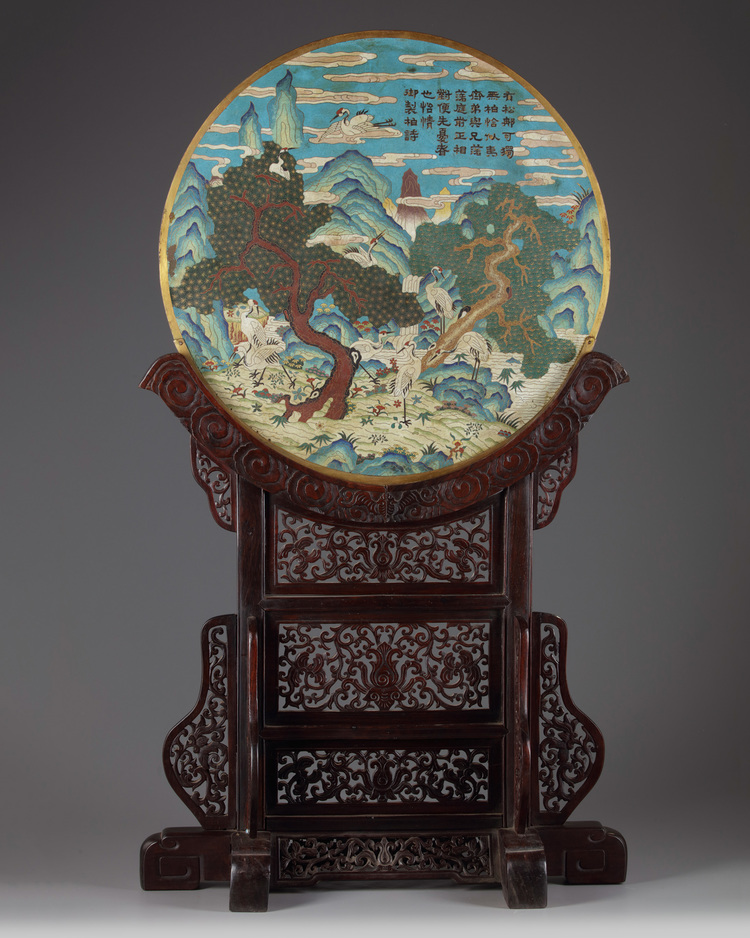 A Chinese cloisonne enamel plaque and a wood stand