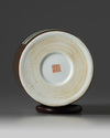 A Chinese brown-ground famille rose brush pot, bitong