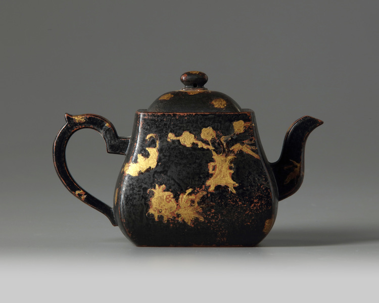 A Chinese black-and gilt decorated teapot