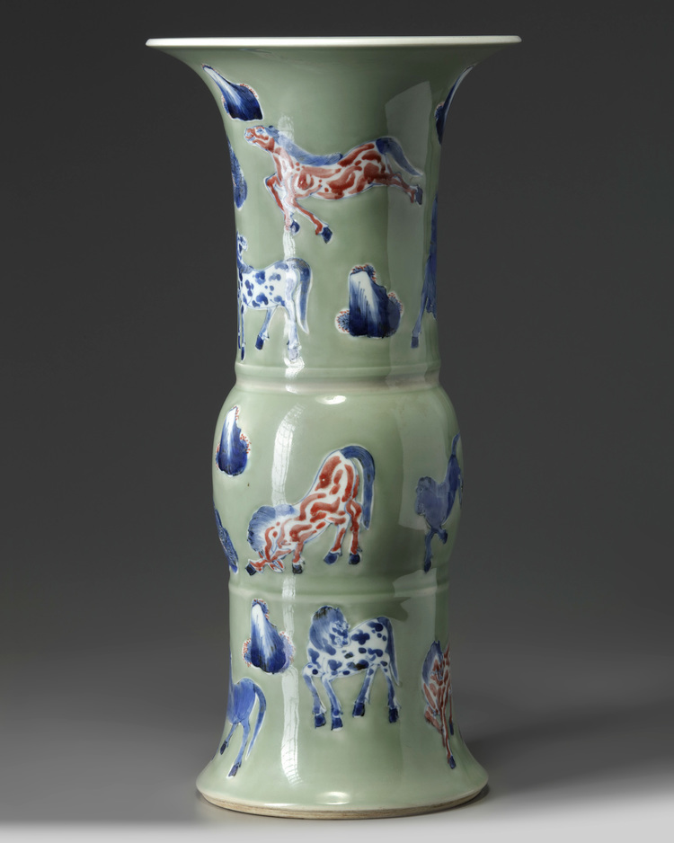 A Chinese celadon-ground blue and white and copper-red-decorated gu vase