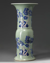 A Chinese celadon-ground blue and white and copper-red-decorated gu vase