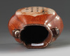 A small Chinese imitation-wood hu vase