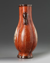 A small Chinese imitation-wood hu vase