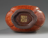 A small Chinese imitation-wood hu vase