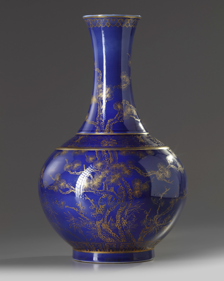A Chinese blue-ground gilt decorated 'Three Friends of Winter' bottle vase